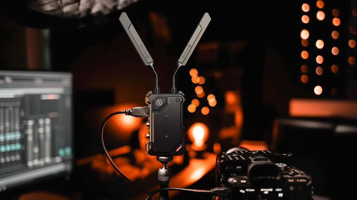 Hollyland Cosmo C2 wireless video transmitter system with two transmitters and one receiver for professional video transmission.