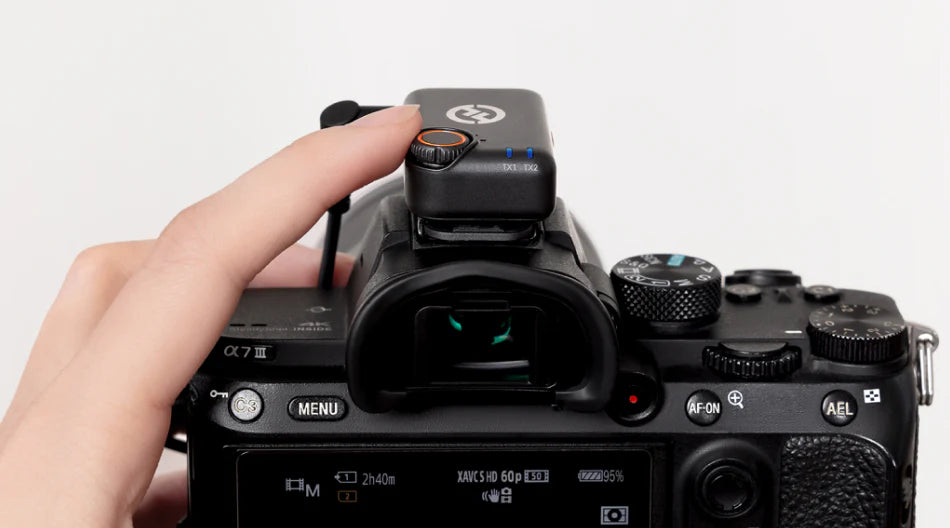 Hollyland Lark M2S Mini Combo (2RX - Camera & USB-C) wireless microphone system, close-up.