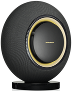Marantz Horizon wireless speakers in midnight finish, sleek design with black accents, showing the modern audio device on a wooden surface.
