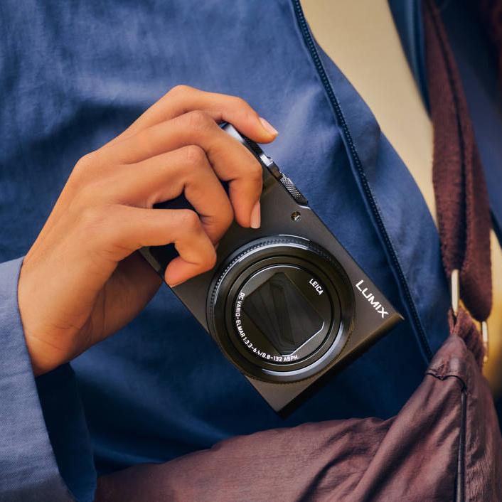 Panasonic LUMIX TZ300 compact camera with zoom lens and electronic viewfinder, ready for travel photography.
