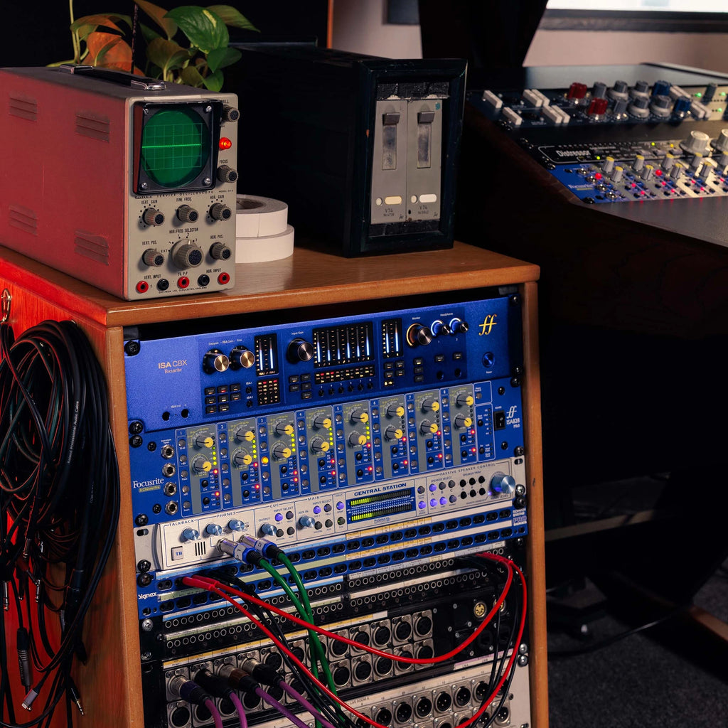 Focusrite ISA C8X USB audio interface with professional input and output connections, compact design, and sleek black finish.