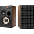 Black JBL L52 Classic passive bookshelf speakers, showcasing their sleek design and compact form in a modern home setting.