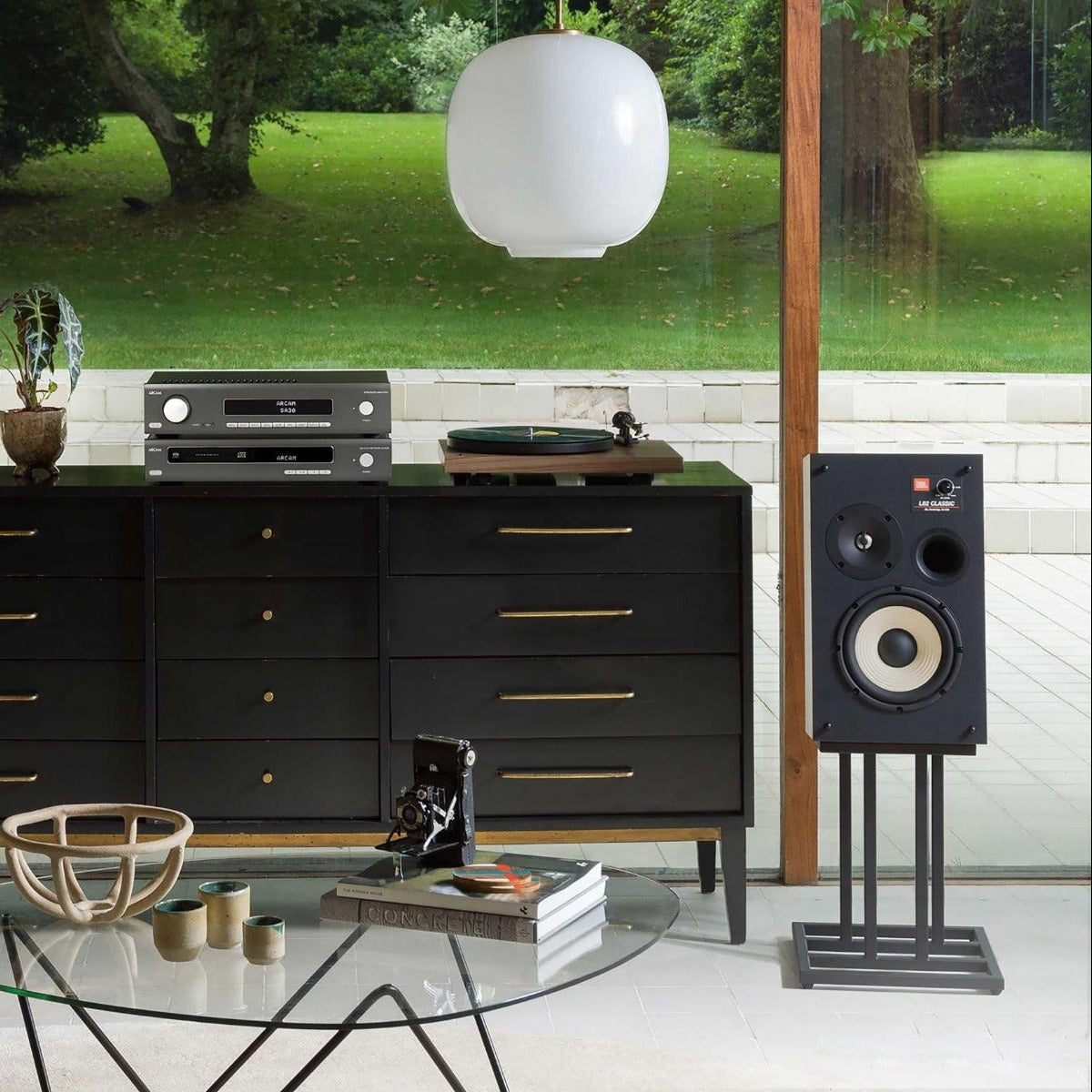 JBL L82 Classic MK2 passive bookshelf speakers with black wooden cabinets and metal grilles, designed for high-quality audio.