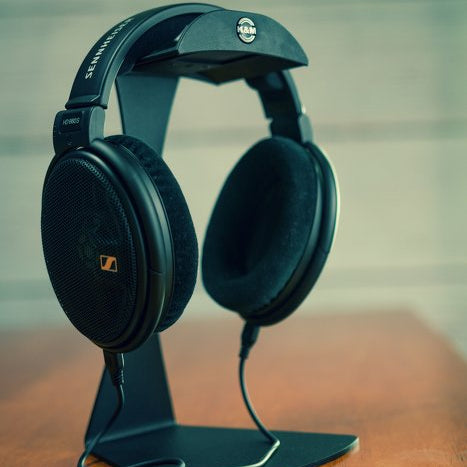 K&M 16075 headphone stand, lifestyle setup, in black