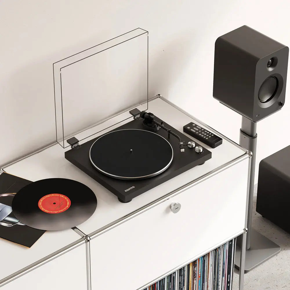 Kanto Audio OBI3 turntable, in black, lifestyle setting