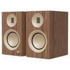 Kanto Audio TUK G2 powered speakers in Matte Walnut with rose gold waveguides, three-quarter view