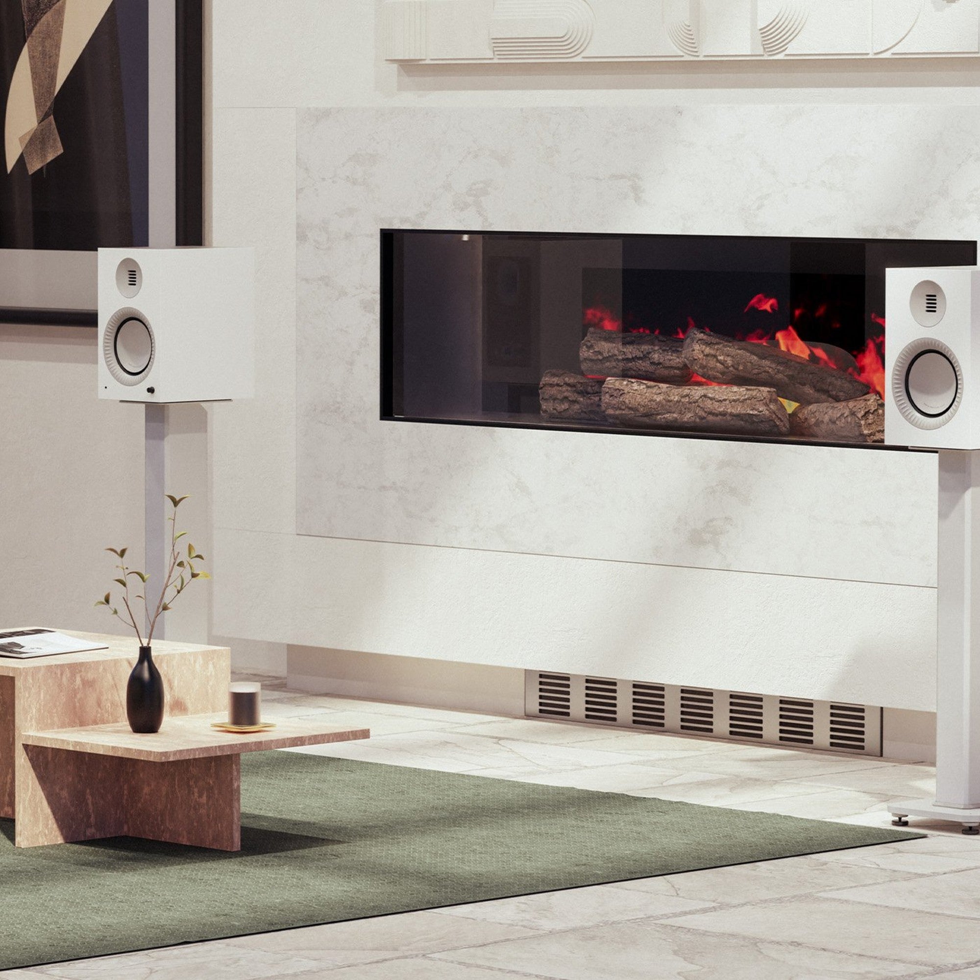 Kanto Audio TUK Grand in Matte White on stands either side of a fireplace