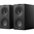 Pair of KEF Q Concerto Meta passive bookshelf speakers with sleek black cabinets and detailed driver grilles, ideal for home audio.