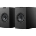 Pair of KEF Q1 Meta passive bookshelf speakers with sleek black cabinets and front-facing drivers on a white background.