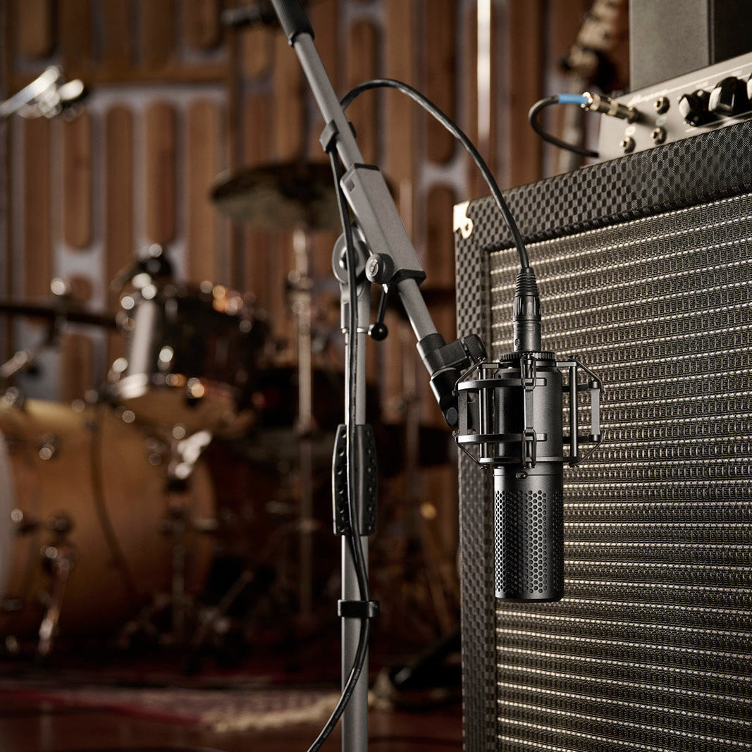 Shure KSM40C condenser microphone with a sleek design, suitable for professional audio recording and live sound applications.