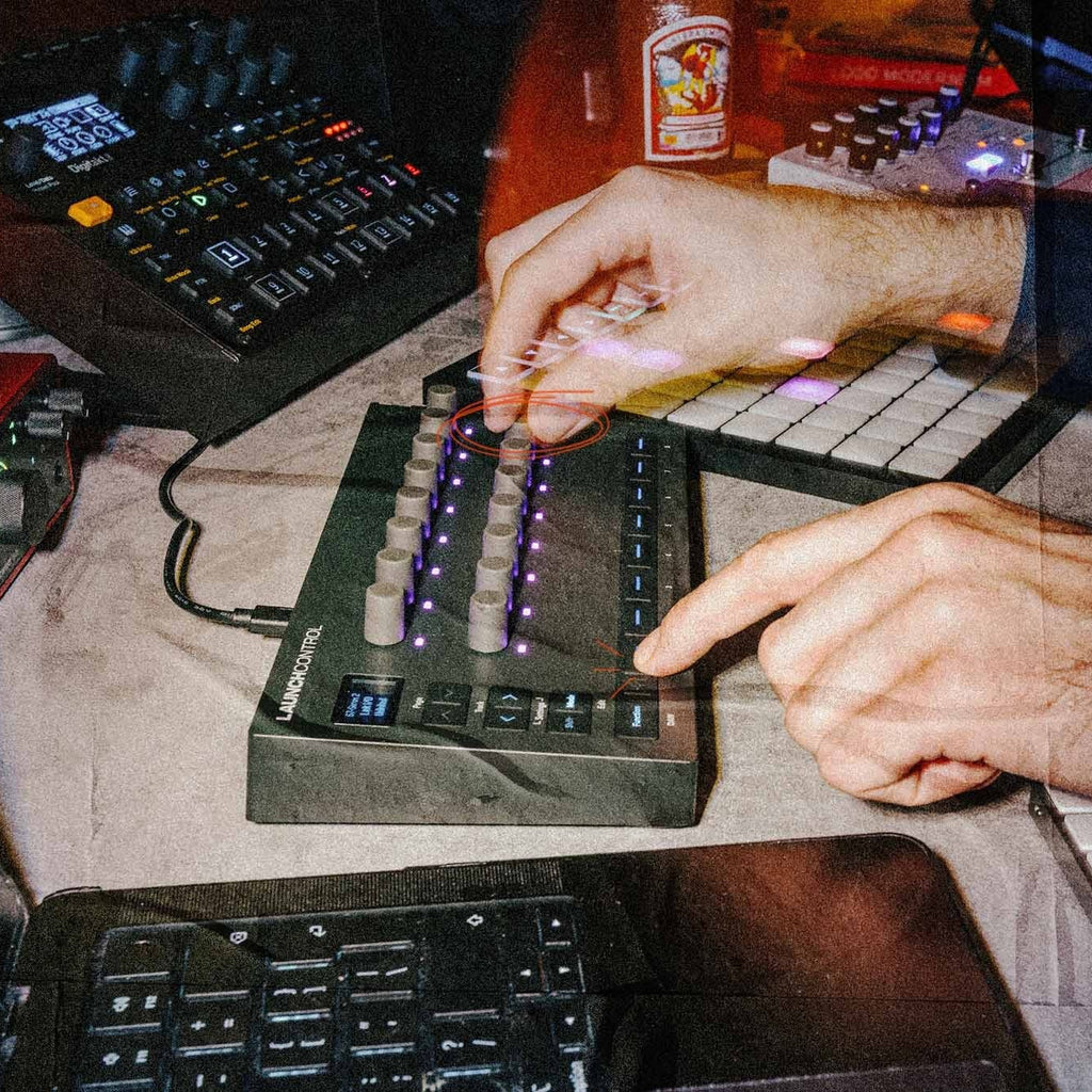 Novation Launch Control 3 MIDI controller with colorful pads and knobs, designed for music production and live performance.