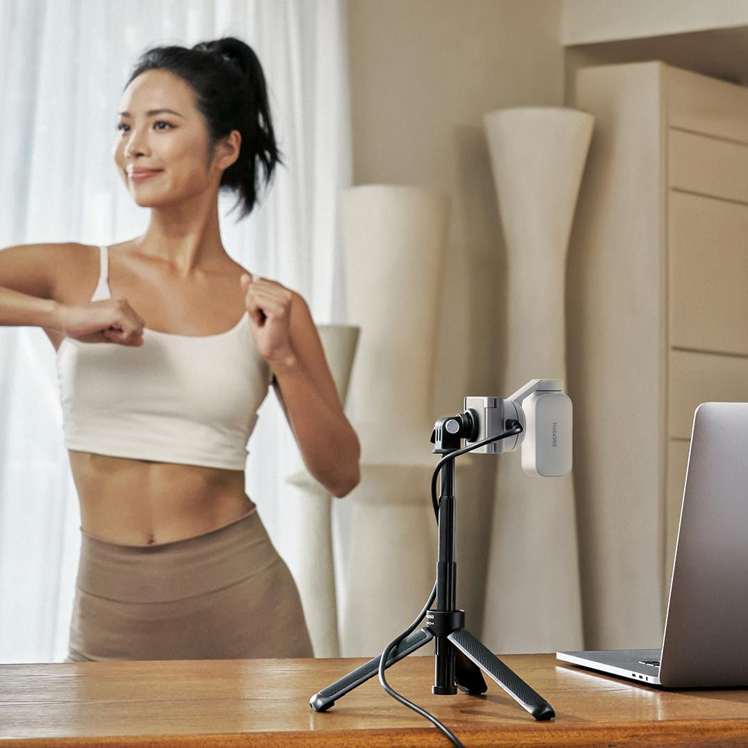Insta360 Link 2 Standard video conferencing camera showing lens, adjustable stand, and sleek design for high-quality video calls.