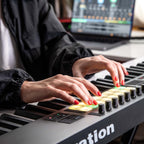 Novation Launchkey 61 MK4 MIDI keyboard with keys, control knobs, and pads, designed for music production and performance.