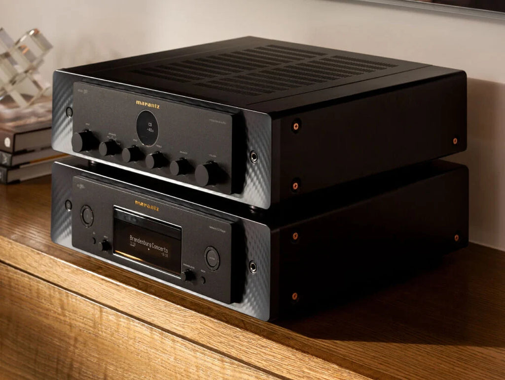 Marantz MODEL 50 stereo amplifier with sleek design and control knobs, displayed in a collage-style image.