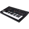Moog Messenger synthesizer with keyboard and control panel, featuring knobs and switches for electronic music production.