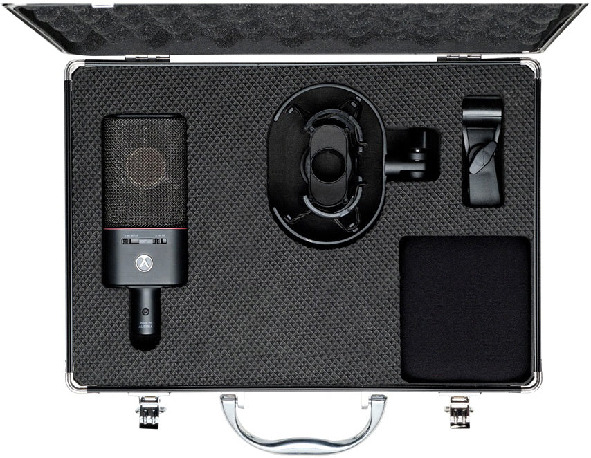 Austrian Audio OC18 condenser microphone set with multiple microphones and accessories for studio recording.