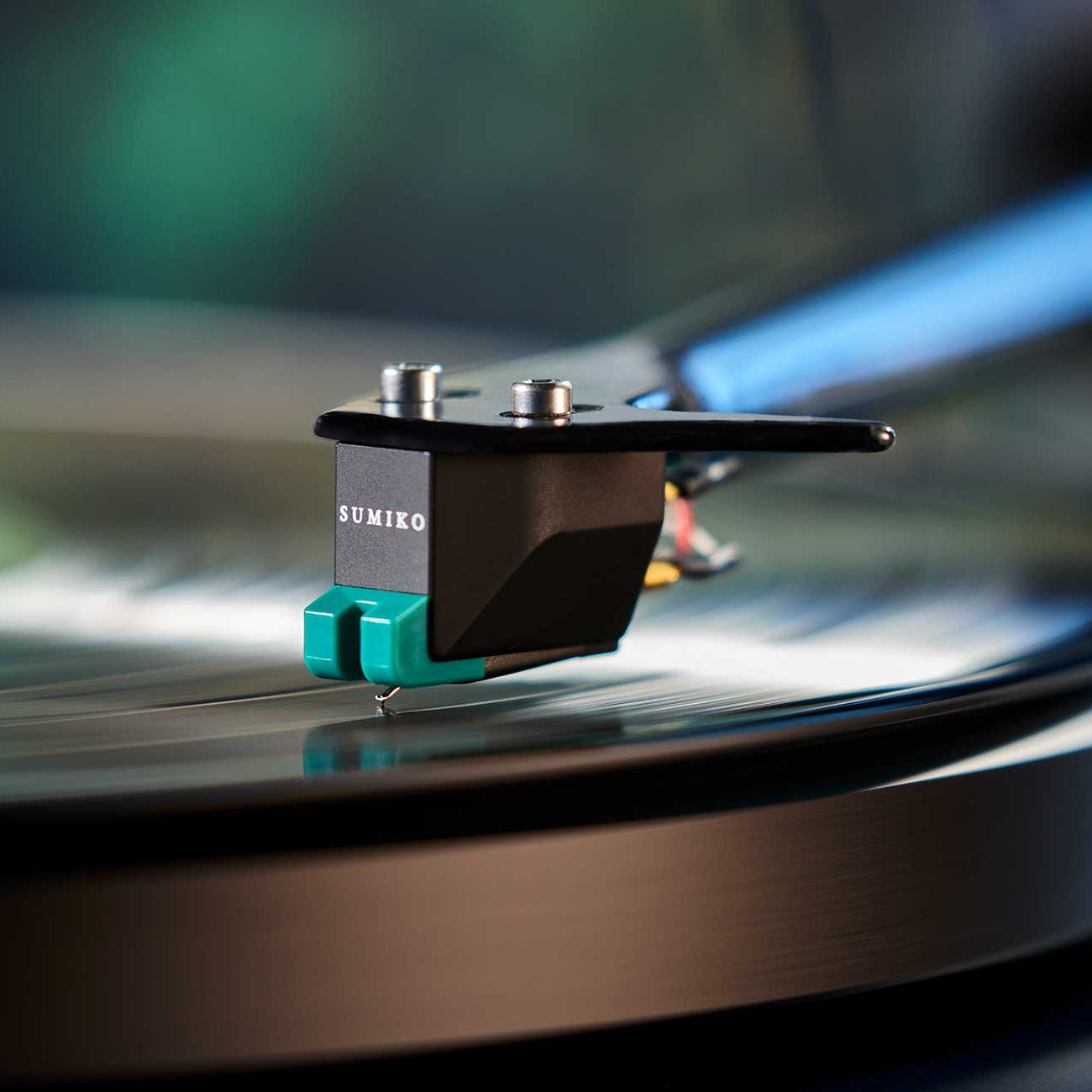 Sumiko Olympia MM phono cartridge mounted on a Debut Carbon EVO turntable, showcasing its sleek design and build quality.