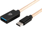 iFi Audio Type-C OTG cable with a sleek design, featuring USB connectors for easy data transfer and device connectivity.