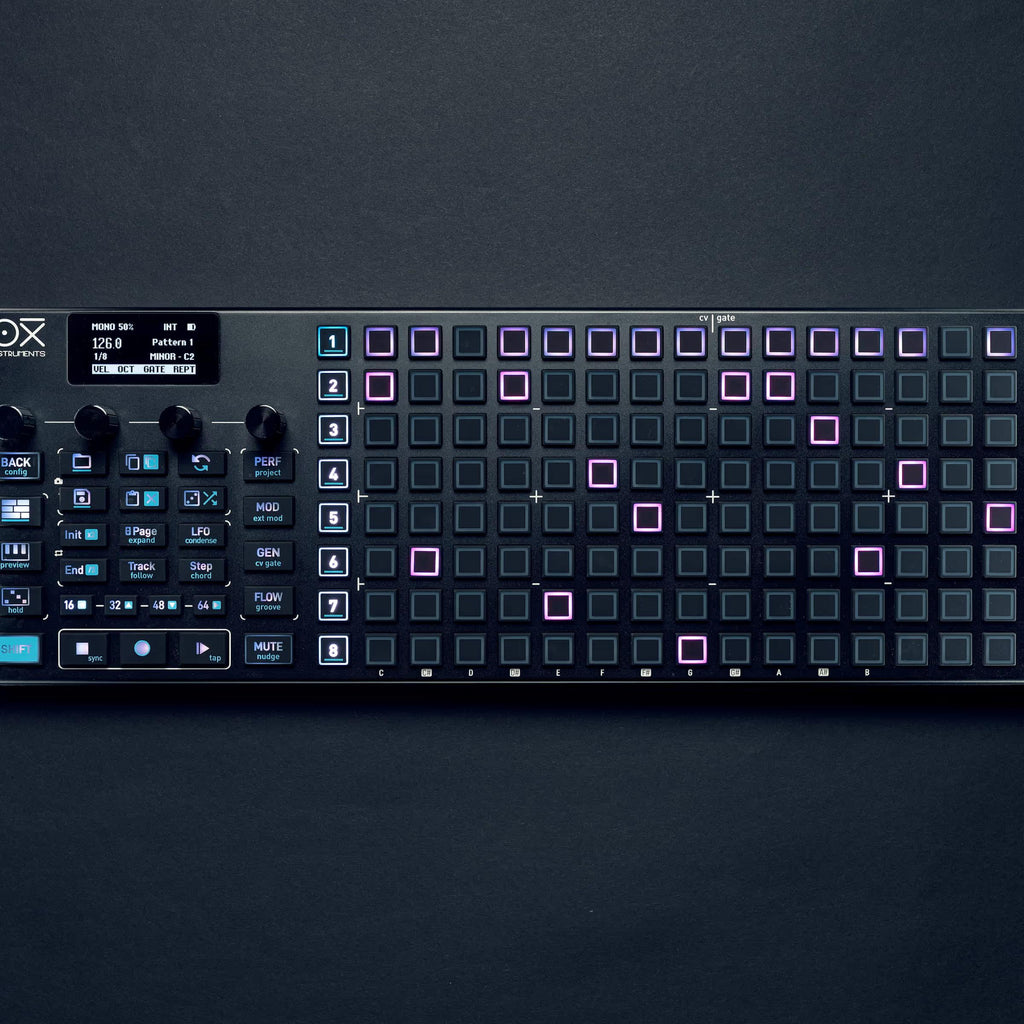 OXI Instruments One MKII Nostalgia sequencer with colorful buttons and vintage-inspired design, displayed on a desk.