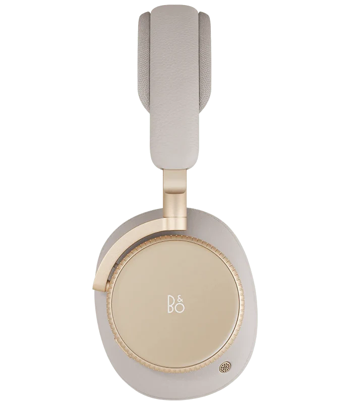 Bang & Olufsen Beoplay H100 wireless headphones with an elegant hourglass sand design, shown from the front.