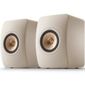 KEF LS50 Meta passive bookshelf speakers with sleek black finish and modern design, showcasing their compact form and high-quality build.