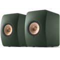 KEF LS50 Wireless II wireless bookshelf speakers with sleek black finish and modern design, featuring front grille and control panel.