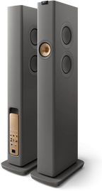 KEF LS60 Wireless floorstanding speakers with sleek black finish, showcasing their modern design and speaker grille details.