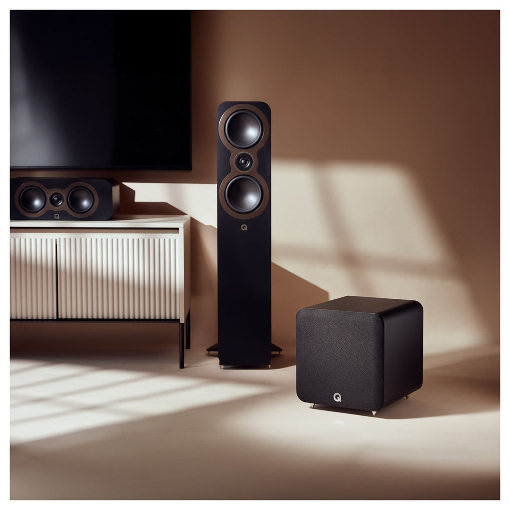 Q Acoustics Q SUB80 subwoofer with sleek black enclosure and front-facing driver for powerful bass in home audio systems.