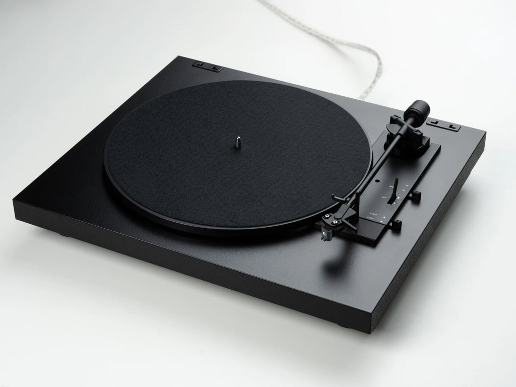 Pro-Ject Automat A1.2 turntable with diagonal felt mat, featuring sleek design and tonearm for high-quality vinyl playback.