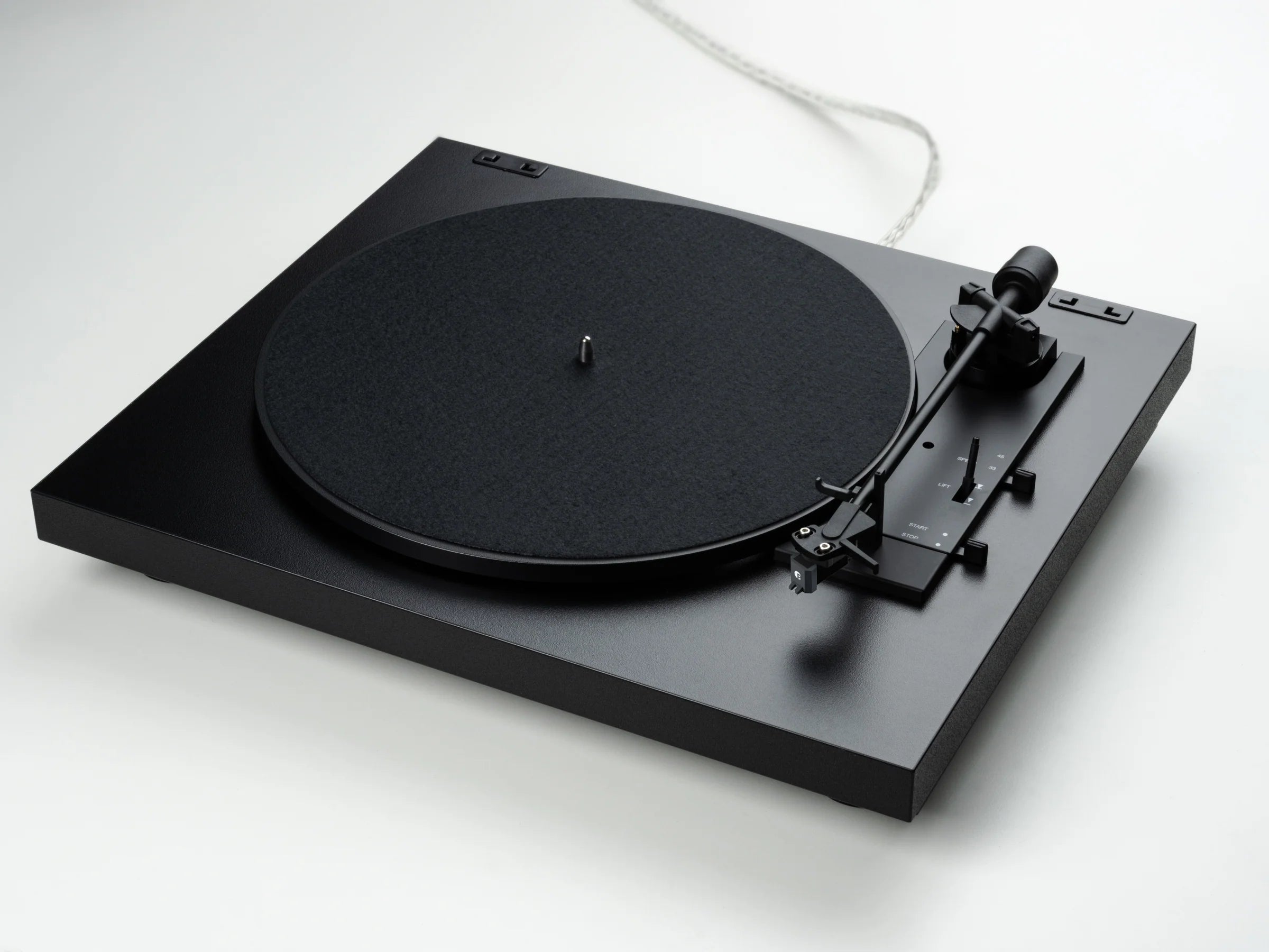 Pro-Ject Automat A1.2 turntable with diagonal felt mat, featuring sleek design and tonearm for high-quality vinyl playback.