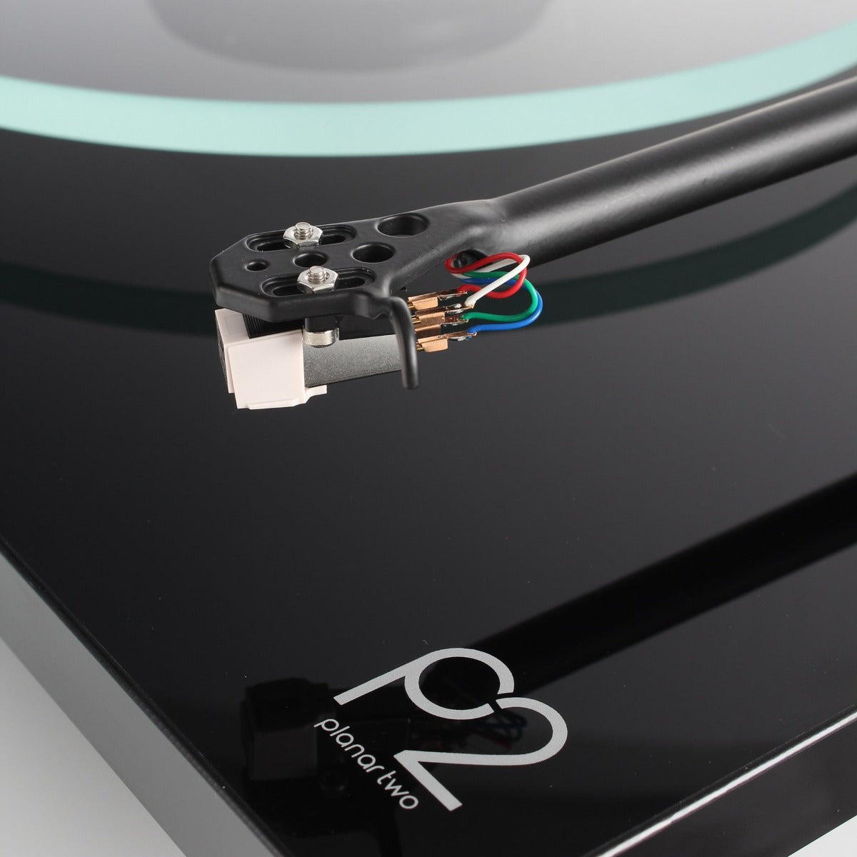 Black Rega Planar 2 turntable with Nd3 cartridge, featuring a sleek design and tonearm for high-quality vinyl playback.