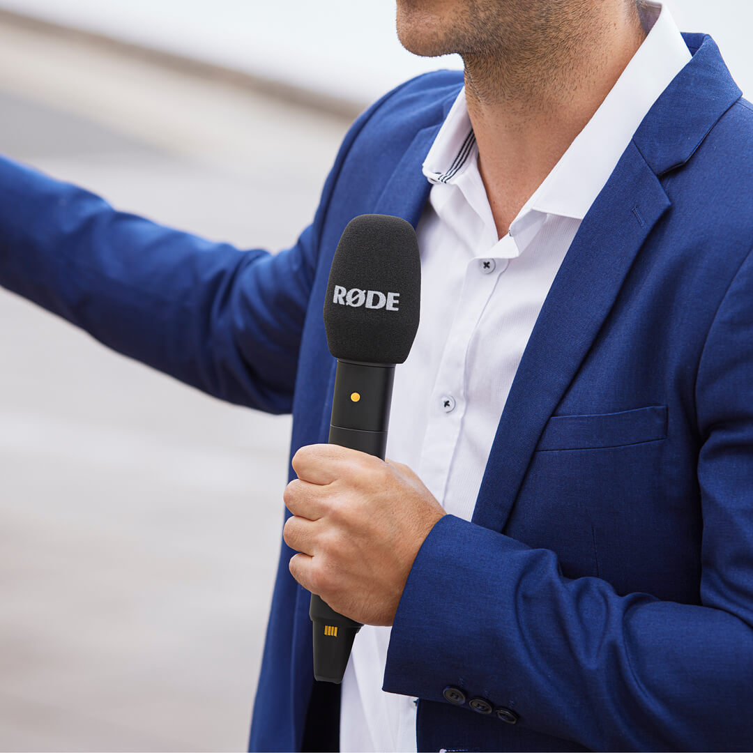 Close-up of Rode Interview Pro wireless microphone accessory with Rode branding, designed for professional TV reporting and interviews.