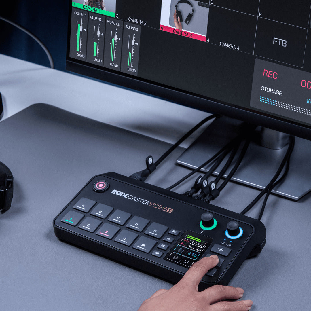 Rode RodeCaster Video S video editing controller with multiple buttons and knobs on a desk setup.