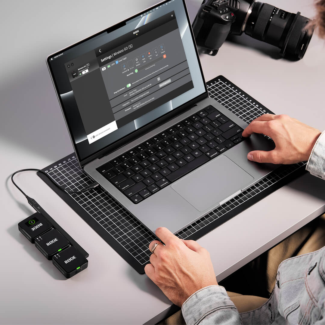 Rode Wireless GO 3 third-generation wireless microphone system with compact transmitter and receiver on a white background.