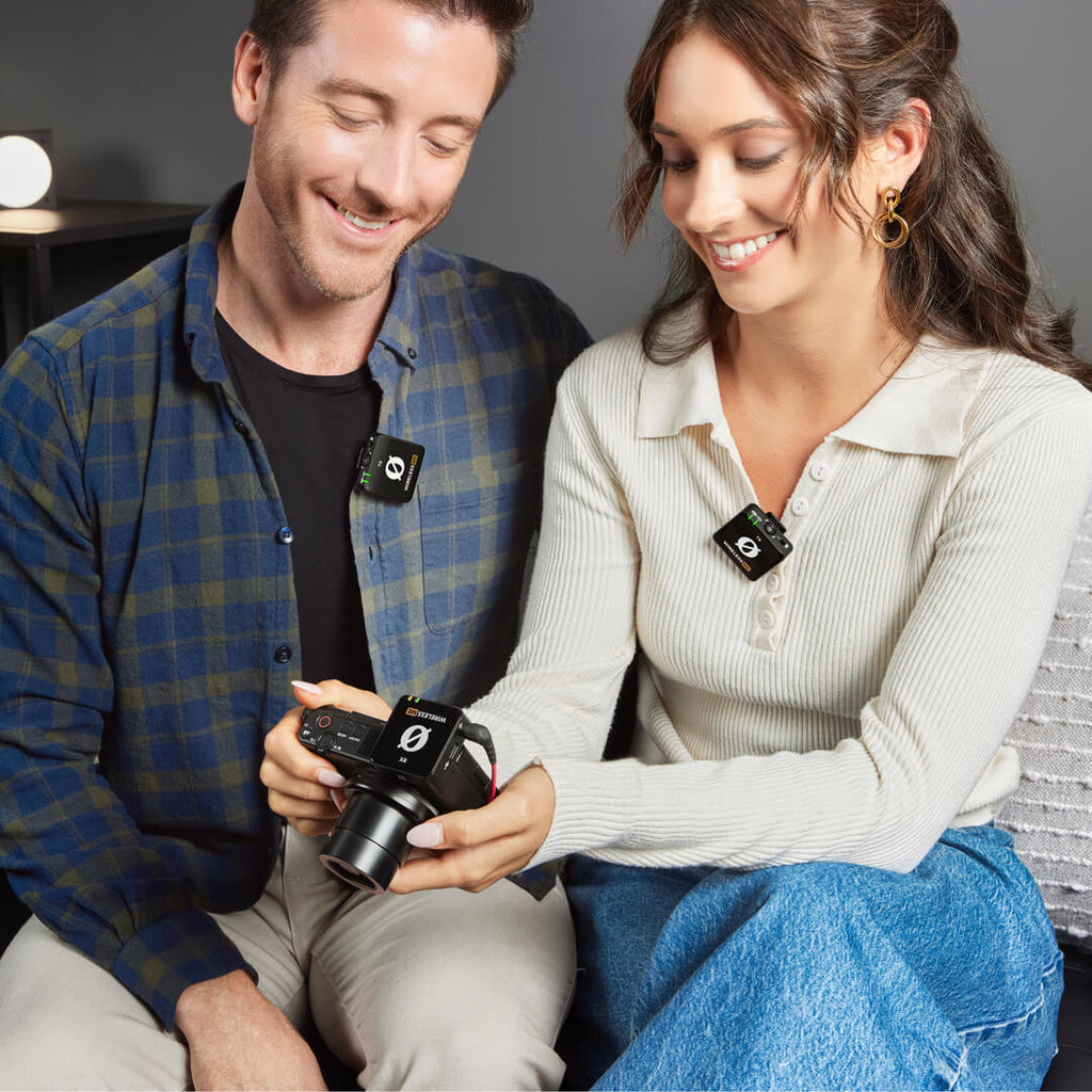 Rode Wireless ME Dual creator wireless microphone system in black, shown with camera and accessories for professional audio recording