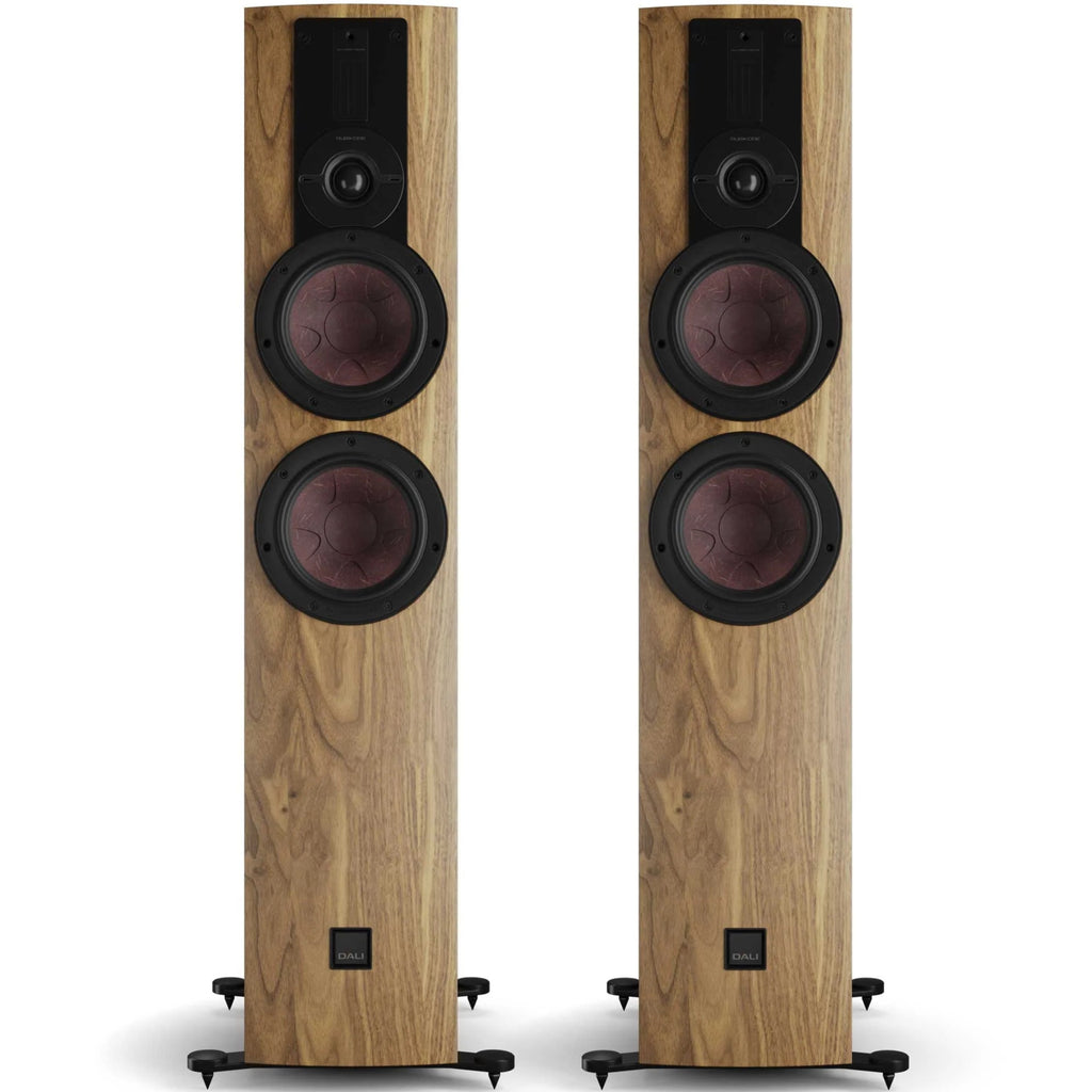 DALI Rubikore 6 passive floorstanding speakers in walnut finish, showcasing sleek front design and high-quality audio components.