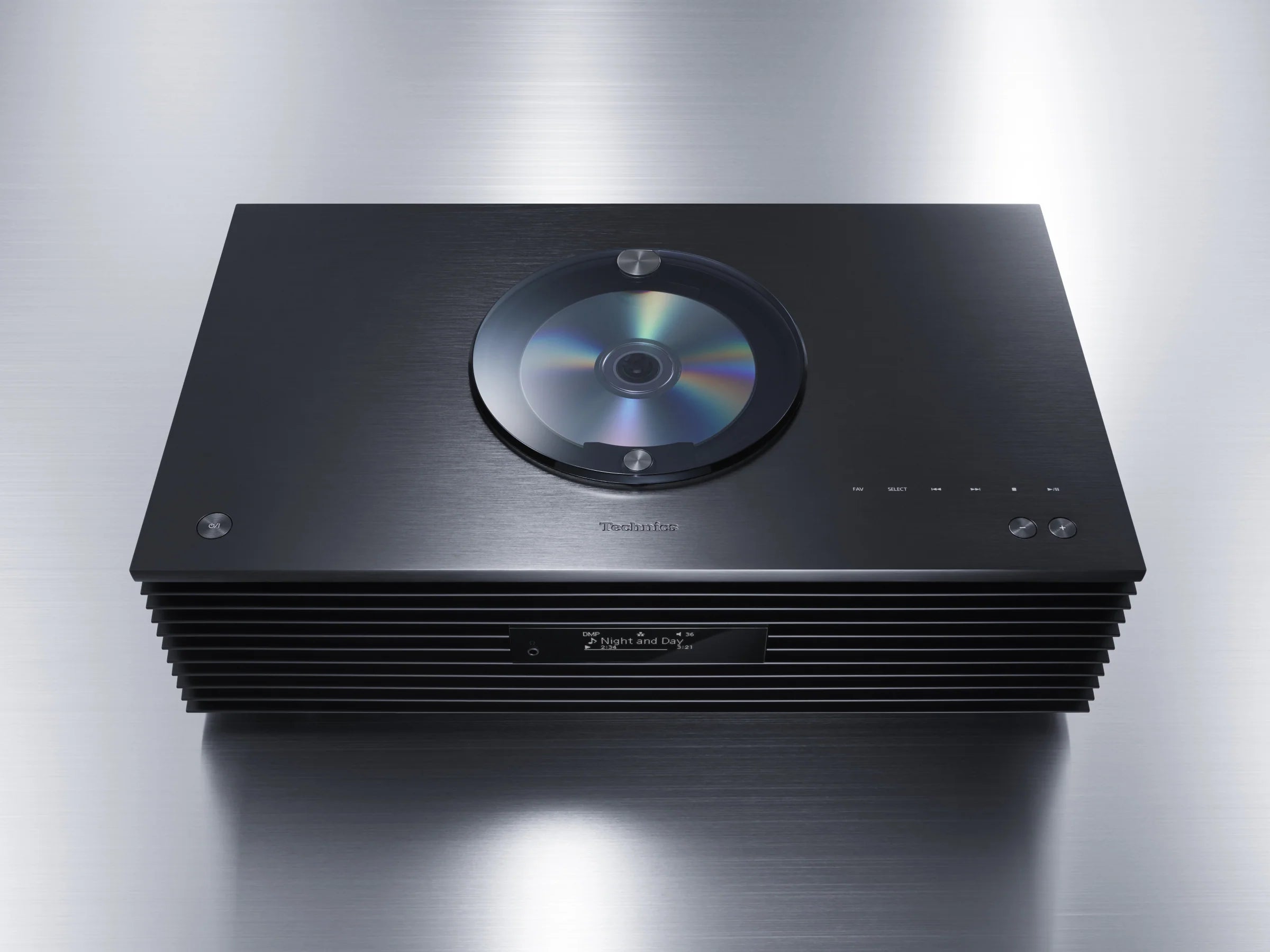 Technics SC-C70MK2 CD player with black finish, front-loading disc tray, digital display, and control buttons on a sleek modern design.