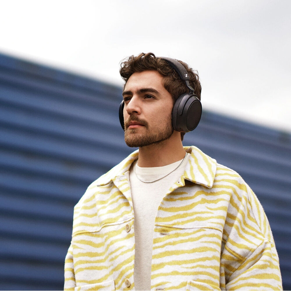 Sennheiser Momentum 4 Wireless headphones, lifestyle worn by a man, black