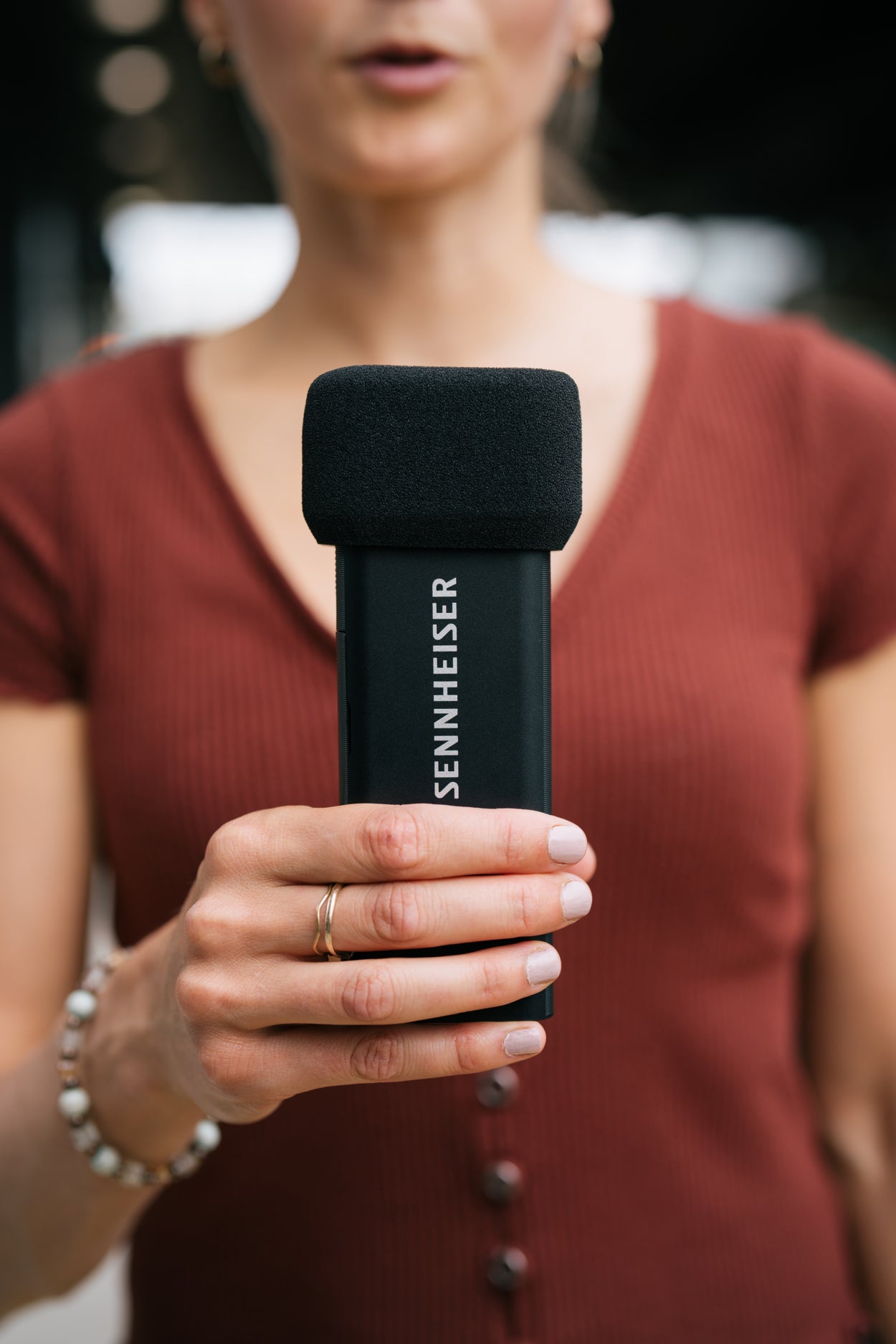 Sennheiser Profile Wireless Creator microphone system with sleek black body and compact design for professional audio recording.