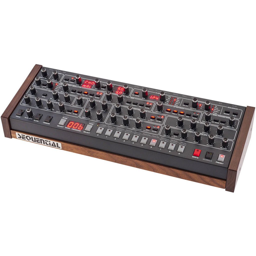 Sequential Prophet-6 Desktop synthesizer with keyboard and control panel, featuring multiple knobs and buttons for sound shaping.