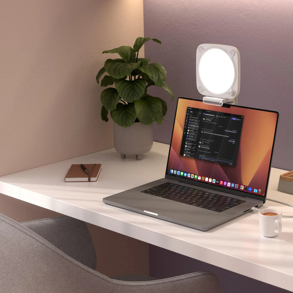 Elgato Key Light Neo bi-color LED light setup on a desktop, providing adjustable lighting for streaming or video recording.