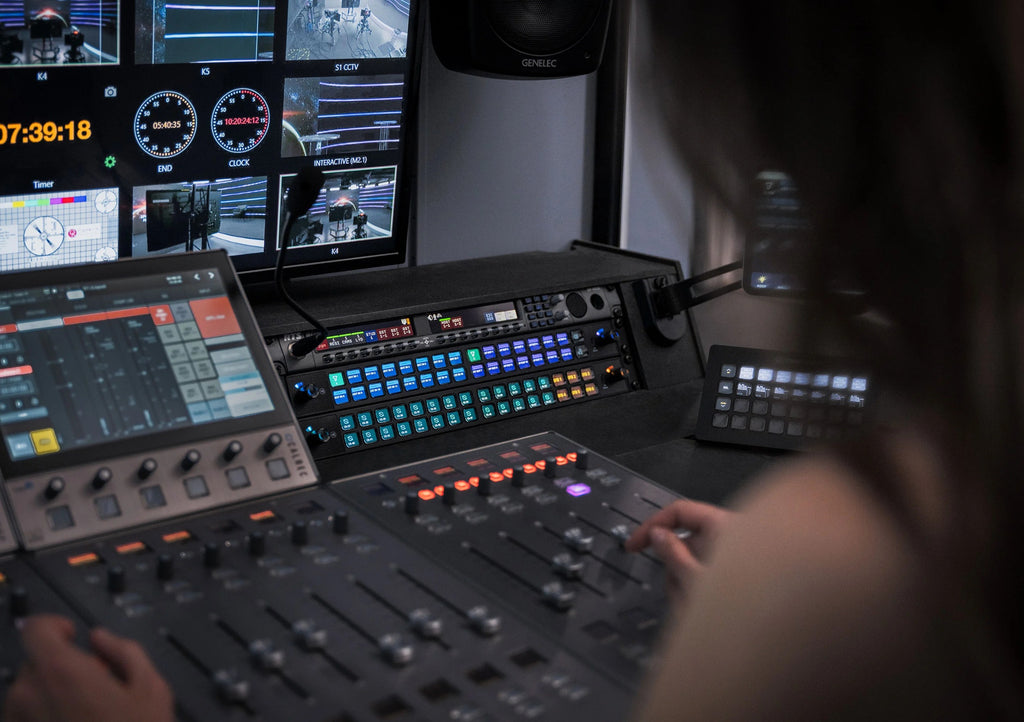 Elgato Stream Deck Studio video editing controller with customizable LCD keys and professional layout on a desk.