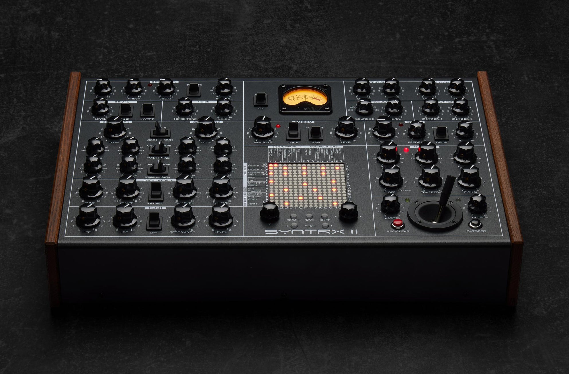 Erica Synths SYNTRX II desktop synthesizer with knobs, pads, and control interface for electronic music production.