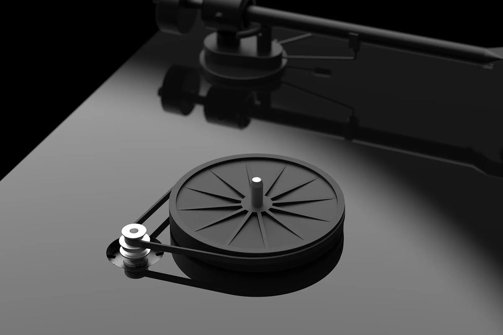 Pro-Ject T1 EVO turntable with black finish, showcasing its sleek design and tonearm details on a clean background.