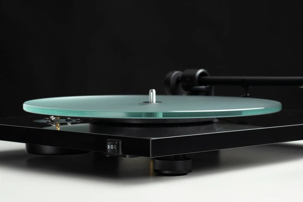 Pro-Ject T1 EVO turntable showing the speed switch for selecting 33 or 45 RPM playback.
