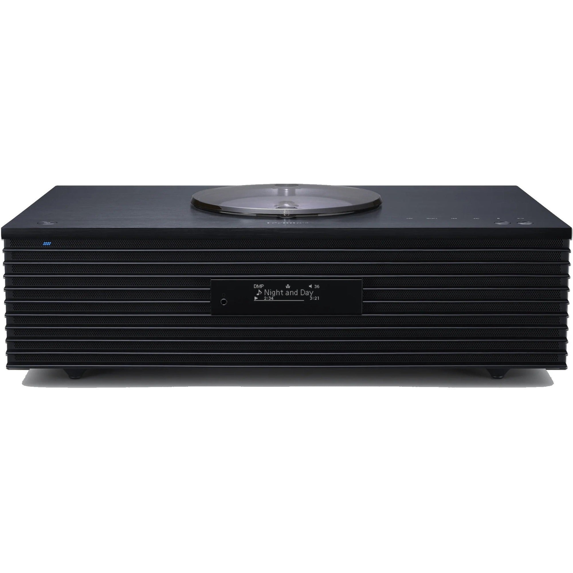 Technics SC-C70MK2 CD player with sleek design, digital display, and control buttons on top, in a modern home audio setup.