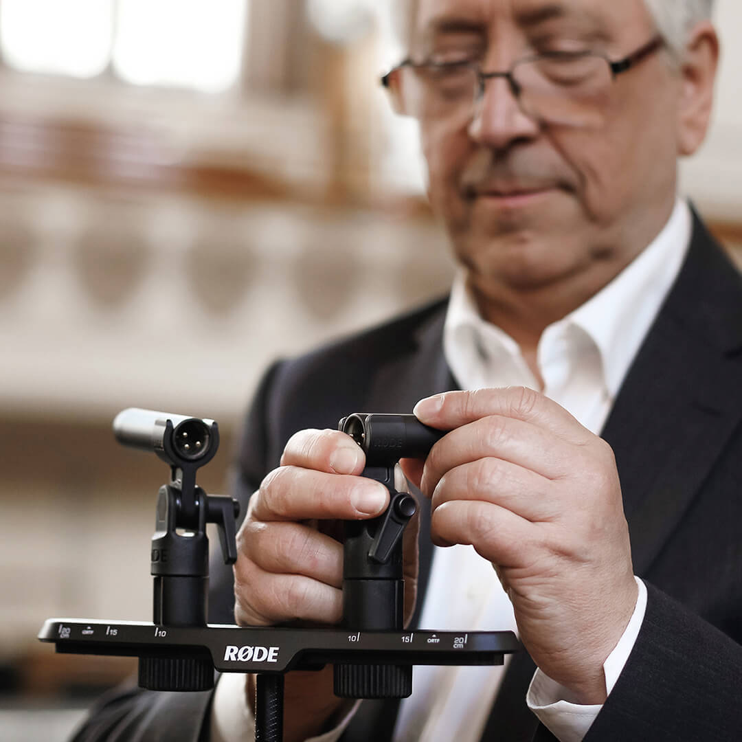 Rode TF-5 condenser microphone with black body and shock mount, designed for professional audio recording and studio use.