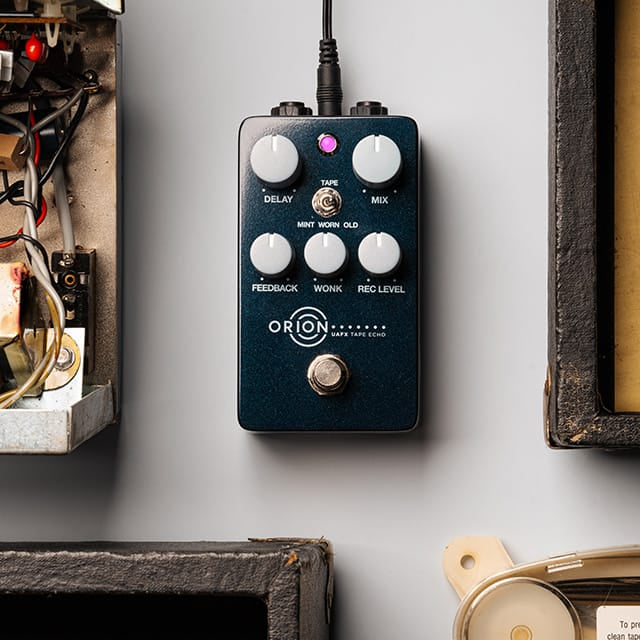 Universal Audio UAFX Orion Tape Echo effects pedal with vintage-style tape echo controls and interface.