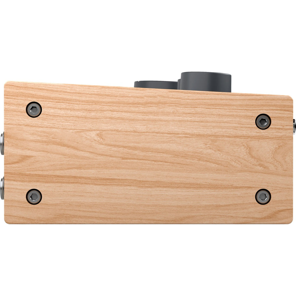 Universal Audio Volt 276 audio interface, side view with wood panel