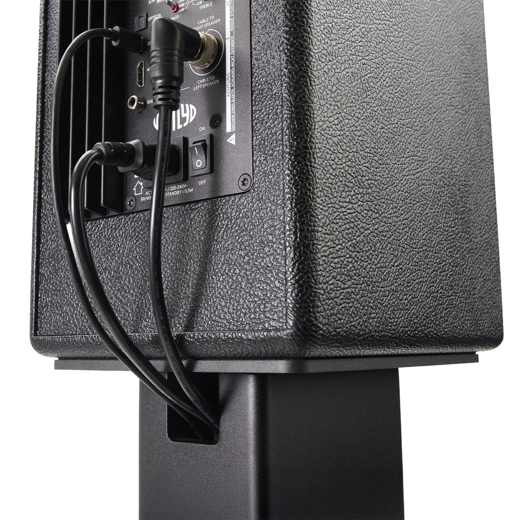 Cable management detail behind a Vestlyd speaker mounted on the M-Stands